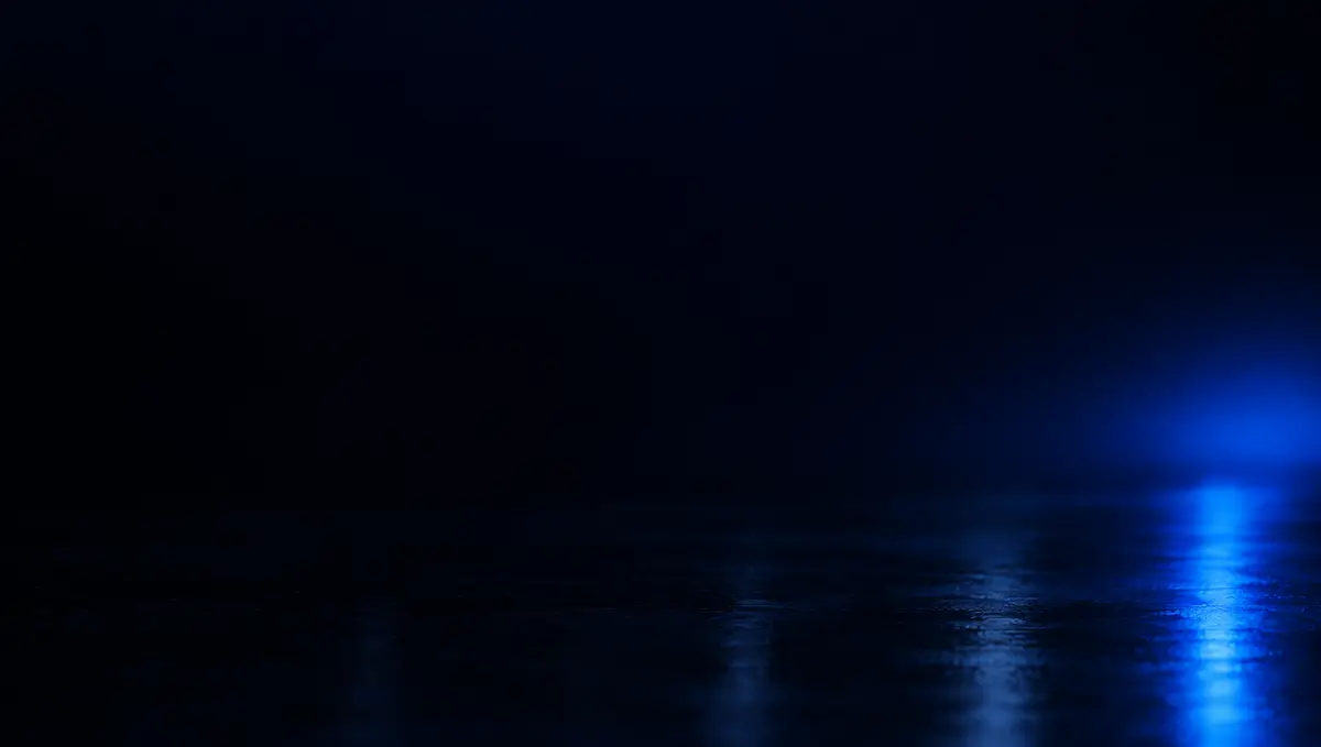 Dark studio floor lit in blue